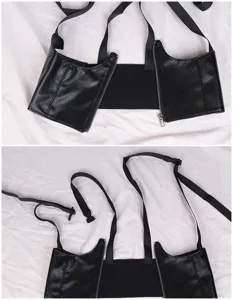 Detail view of black elastic wide waist corset featuring metal zipper and adjustable straps