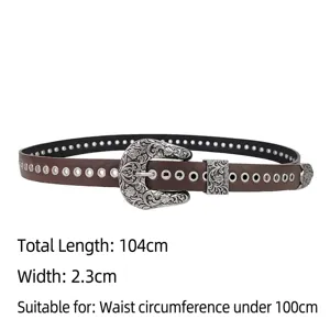 Vintage Y2K punk style brown belt with decorative carved buckle and metal rivets for jeans