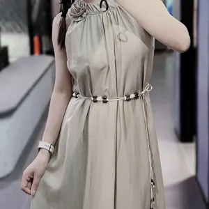 Handmade bohemian style woven waist belt with wooden beads for ethnic retro dresses.