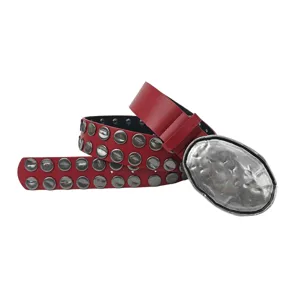 Red punk rock studded leather belt with a large irregular silver metal buckle for men