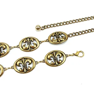 Vintage gold metal waist chain belt with elegant fleur-de-lis motif for women's dresses