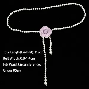 Elegant white pearl waist chain featuring a sweet purple fabric rose flower for dress decoration