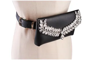 Detailed view of fashion black leather belt bag with sparkling rhinestone wing decoration