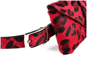 Close-up of red leopard print horse hair waist bag and belt with silver metal buckle