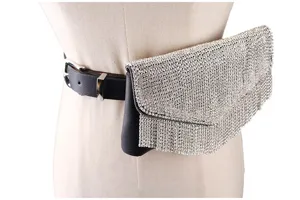 Close-up detail of a fashionable shimmering rhinestone waist bag on a black leather belt