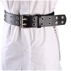Close-up detail of black double grommet leather belt featuring silver buckle and chain