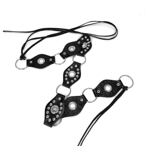 Y2K punk style black waist belt with metallic rings and rivets detail, 95 chars long.