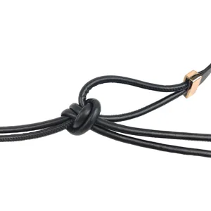 Fashionable black thin knotted leather belt for women with elegant gold buckle detail