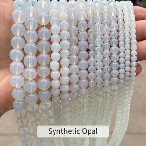 Fili di perle tonde in opalite sintetica in varie dimensioni per gioielli fai-da-te