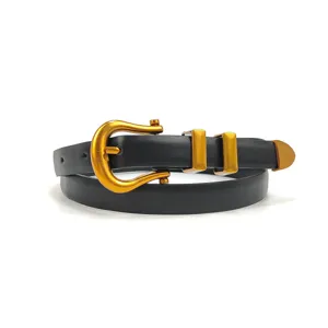 Elegant women's black leather belt featuring a vintage gold-tone horseshoe buckle