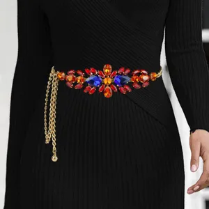 Luxury gold metal waist chain belt featuring vibrant red and blue rhinestones for women's dresses