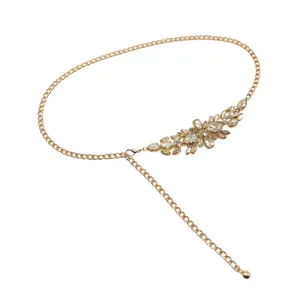 Elegant gold metal chain belt featuring a rhinestone flower for women's dress accessory