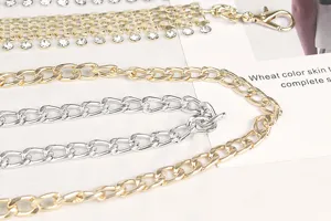 Detailed view of high-quality gold and silver chunky metal waist chains for fashion dresses