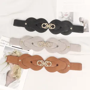 Elastic punk style women's wide belt with gold buckle and rivet detailing in three colors
