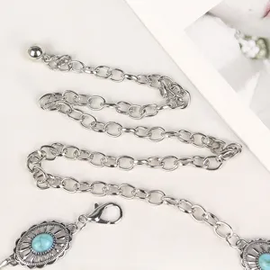 Bohemian silver metal chain belt featuring turquoise stones and an adjustable lobster clasp