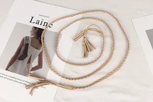 Detailed macro view showing the braided texture and tassels of this vintage waist rope belt