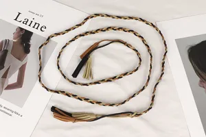 Detailed view of a vintage tri-color braided waist rope belt featuring elegant tassels