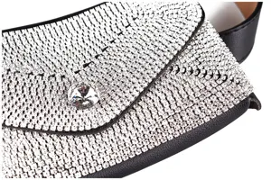 Close-up macro detail of elegant black waist bag covered in sparkling silver rhinestones