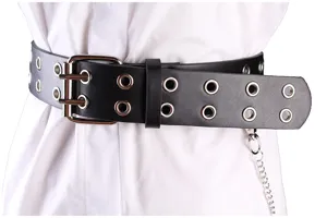 Close-up of a black punk style wide belt with double rows of silver grommets and chain