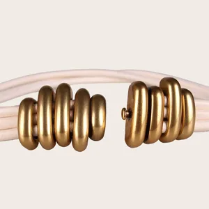 Vintage off-white elastic waist belt for women with unique gold caterpillar metal buckle