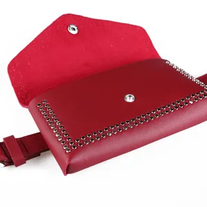 Punk style wine red fanny pack with silver studs and adjustable waist belt