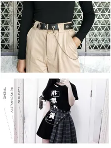 Black punk style wide grommet belt for women featuring a decorative silver metal chain link