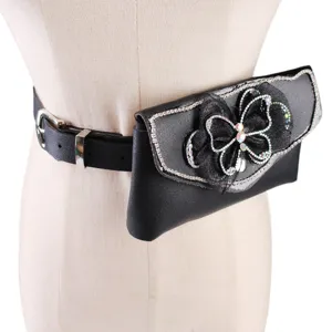 Elegant black faux leather belt bag with sparkling rhinestone butterfly decoration