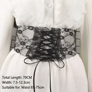 Close-up detail showing the intricate lace pattern and tie fastening of this elastic corset belt