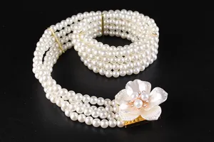 Close-up of elegant four-row pearl belt with rhinestone flower buckle for Hanfu accessories