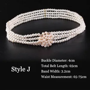 Close-up of four-row pearl elastic belt with sparkling rhinestone flower buckle