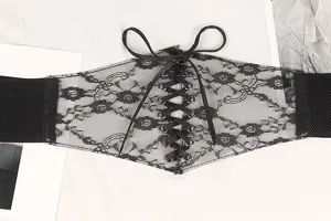 Close-up of black floral lace corset belt with lace-up bandage front detail