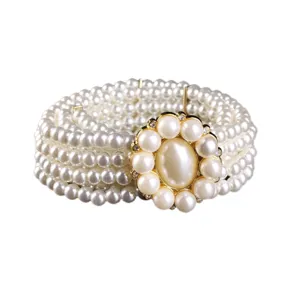 Elegant four-row pearl elastic belt with retro rhinestone flower buckle statement piece