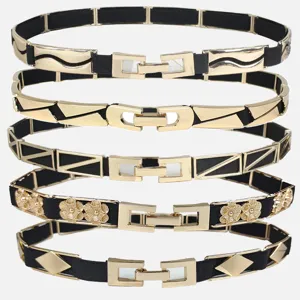 Collection of five vintage elastic waist belts for women with stylish gold metal buckles