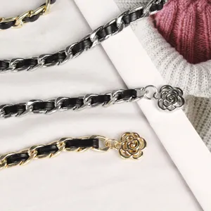 Elegant multilayer metal waist chain with black leather weave and delicate rose charm