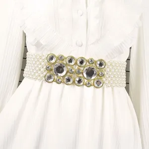 Elegant elastic pearl waist belt for women featuring a large decorative rhinestone buckle