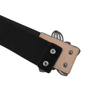 Close-up of black wide elastic waist belt with tan leather patch and snap buttons