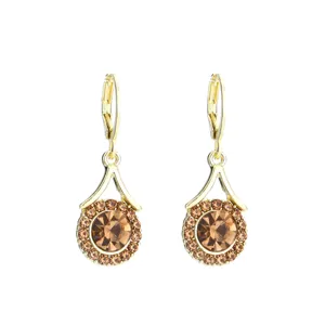 Detailed view of elegant champagne crystal drop earrings in a gold-plated setting