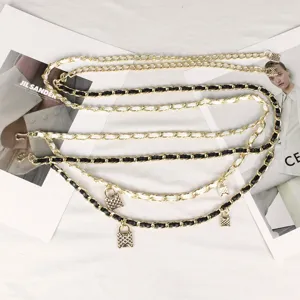 Fashionable gold multi-layered waist chain featuring woven leather and lock charms