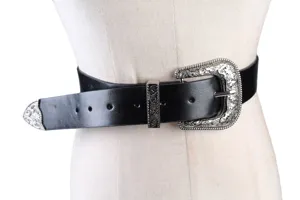 Λεπτομερής προβολή vintage ζώνης στυλ Western με περίτεχνη ασημένια φλοράλ αγκράφα