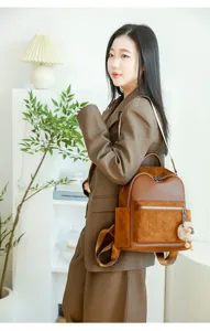 Detailed side view of a stylish brown quilted women's backpack shown on a model