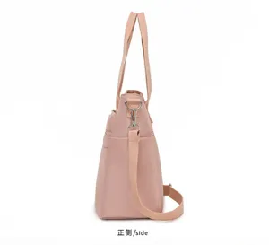 Detaillierte Seitenansicht einer pinken Nylon-Tragetasche für Damen mit viel Platz.
