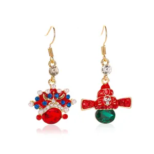 Detailed view of ornate Peking Opera mask dangling earrings with colorful rhinestones