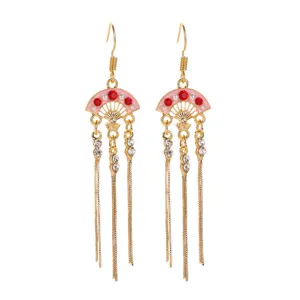 Detailed view of Chinese style retro red fan-shaped tassel earrings with rhinestones