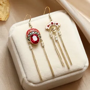 Elegant Chinese Peking Opera mask drop earrings with red crystal and long tassels.
