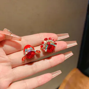 Red Peking Opera mask stud earrings with sparkling crystals and pearls in vintage Chinese style.