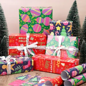 Buntes Weihnachts-Geschenkpapier-Set mit fluoreszierenden Farben und festlichen Motiven