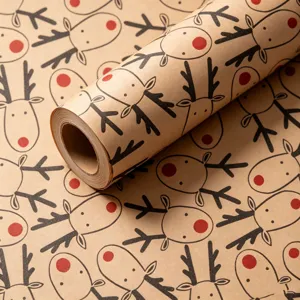 Close-up of brown kraft Christmas wrapping paper with red-nosed reindeer pattern