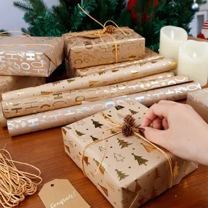 Kerst inpakpapier van Kraftpapier met gouden folie voor feestelijke geschenken