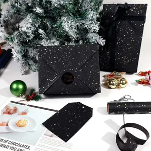 Schwarzes Geschenkpapier mit Gold- und Silberfolien-Flecken für Weihnachtsgeschenke