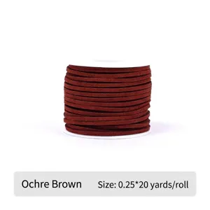 Detailed view of Ocher Brown faux suede cord wrapped around a white spool for gift wrapping.